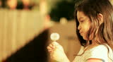 Dandelion little girl innocence Child Blowing a freedom spring childhood summer