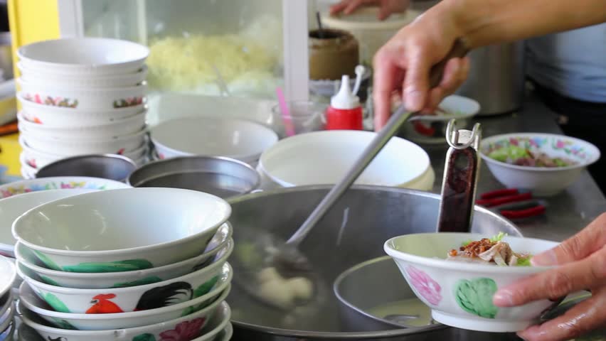 Hawker Vendor Cooking Noodle with Fishballs, Vegetables, Pork Slices in Broth and Fried Onion Shallots Garnish 1080p