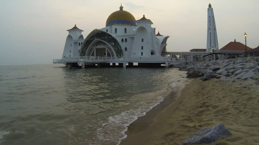 Time lapse at sunset of Selat Mosque in Malacca island Malaysia also known as Malacca Straits mosque