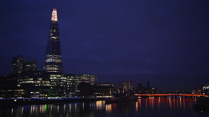 Real time video of The Shard and Southwark skyline in London, UK. Night at the Thames River.