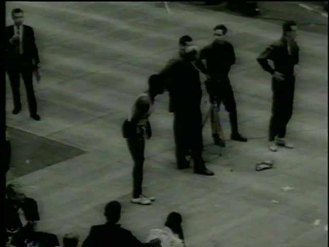 High jumper John Thomas sets a record of 7 ft and 2 in. at the track season of The Knights of Columbus meet in Boston circa 1964-MGM PICTURES, UNIVERSAL-INTERNATIONAL NEWSREEL, USA, filmed in 1964  