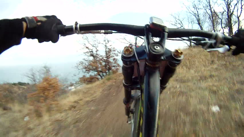 Two cyclists racing in a forest.
Racing in a forest. pov. 
