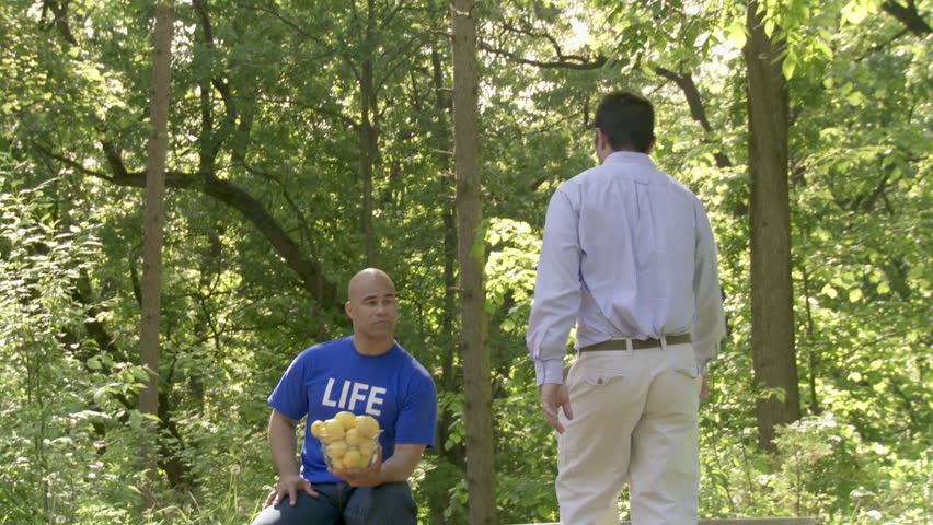 Man sits on a park bench and Life gives him lemons. They magically (jump cut) turn into lemonade which they drink.