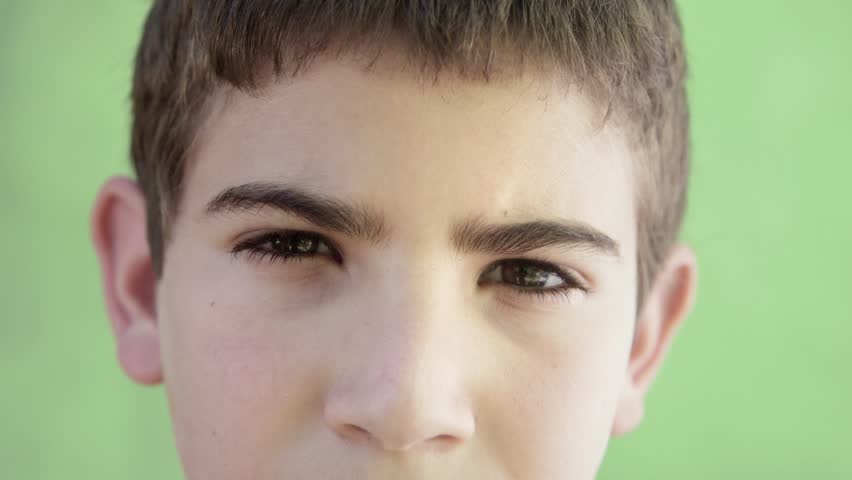 Young people and emotions, portrait of serious kid looking at camera