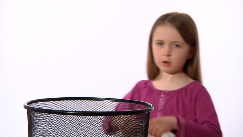 Little girl catches a cough and sneeze in a tissue, puts it in a bin and then kills the germs with hand sanitizer.