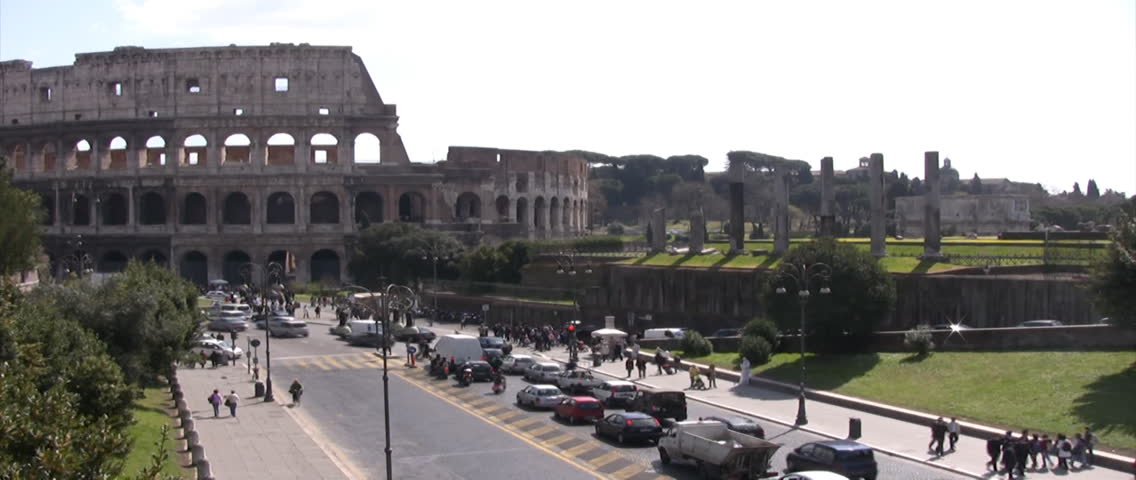 Rome - March 26: Time laps of the traffic in front of the coliseum March 26, 2009 in Rome, Italy