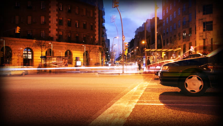 night time rush of traffic at a roundabout in barcelona 