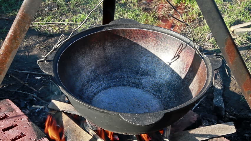 Cooking pilaf. Pour oil