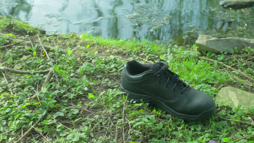 drowning victim concept, male shoe