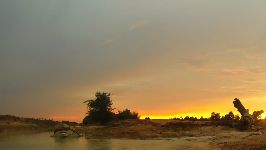 Panning timelapse of golden sunset in west baray close to Siem reap Cambodia