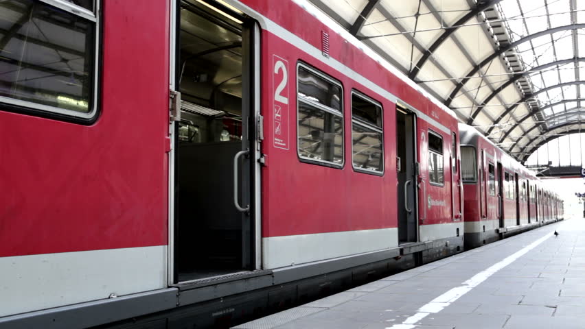 WIESBADEN, GERMANY - MAY 06: A suburb train of german railroad company DB is leaving the station of Wiesbaden on May 06, 2013