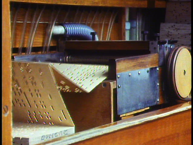 Amsterdam, Holland, The Netherlands, Street organs, close up of wooden sheets moving in the back