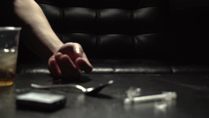 Man passes out on couch after heroin use