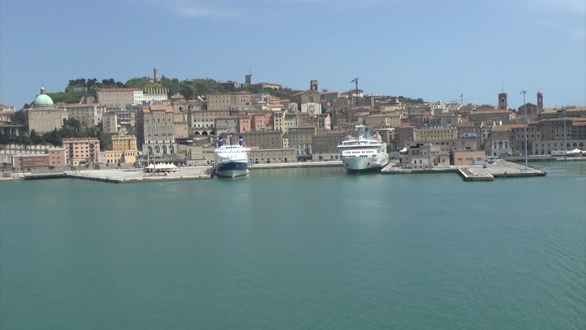 Footage of the view from a Ferry leaving it's berth in a port