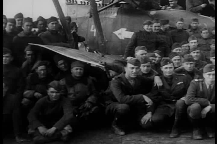 1910s - Eddie Rickenbacker and the 94th Aero Squadron receive medals for their service in World War One.