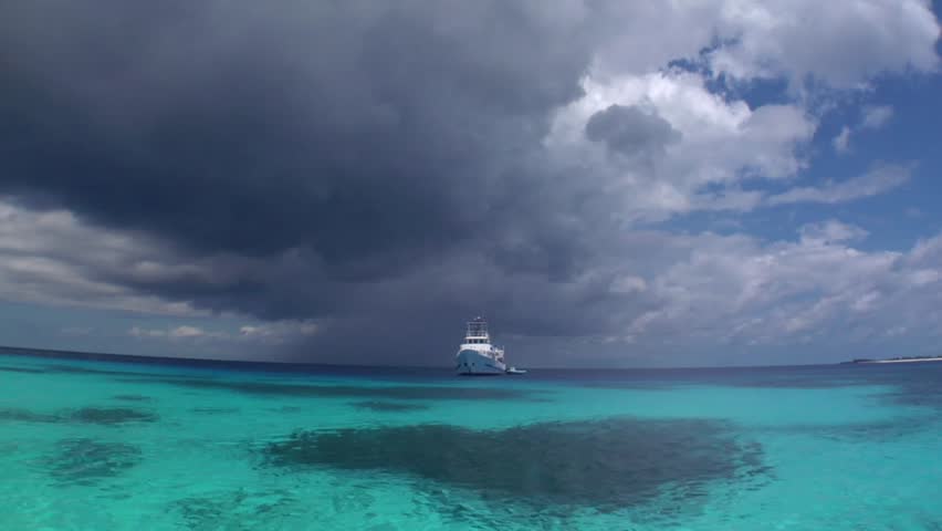 Small Boat anchored at sea 