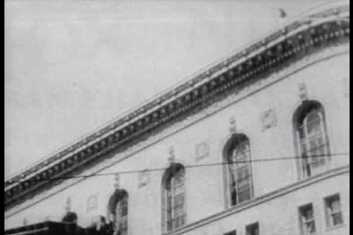 1910s - A man roller skates across the top of a building in this 1918 crazy stunt film.