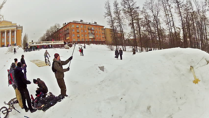 PETROZAVODSK, RUSSIA - FEBRUARY ,16: Biker making jumping tricks during Hyperborea festival on February 16, 2013 in Petrozavodsk, Russia. Event was free for watching and participating, 