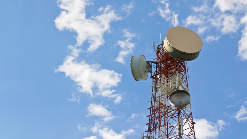 time lapse antenna communication tower and blue sky