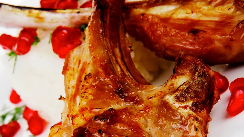 main course: grilled ribs with rice and tomatoes plate 1920x1080 intro motion slow hidef hd