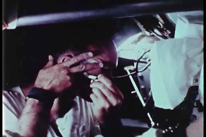 1960s - The interior of the lunar module on Apollo 11 during docking and the activities of the astronauts in the capsule.