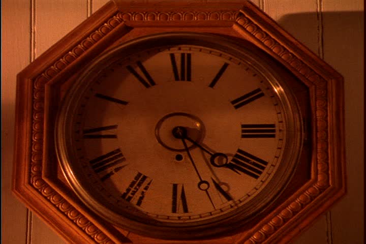Mid Continent Railway, New Freedom, Wisconsin. CU face of pendulum clock hanging in train depot. 