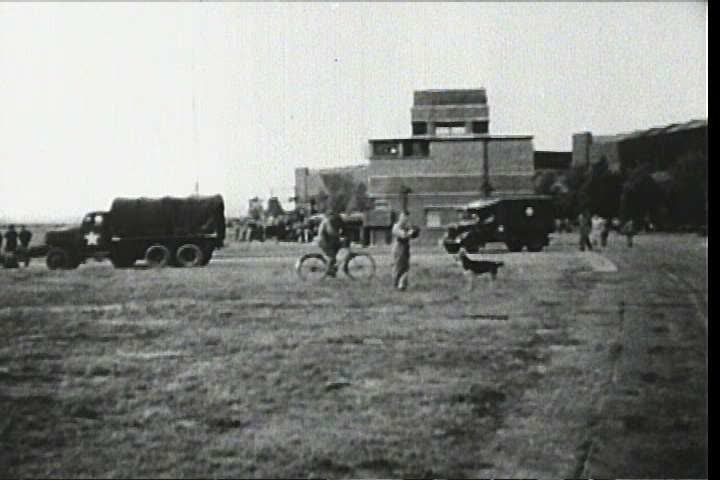 1940s - Air Force bombers fly bombing runs over Nazi Germany during World War Two and then relax at an airbase (bad audio).