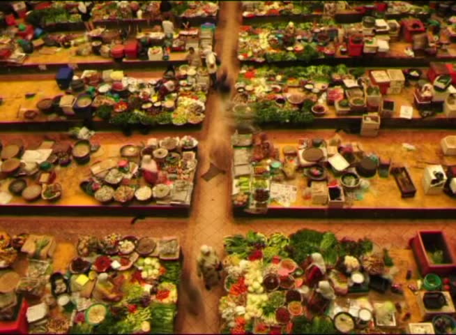 Vegetable market. Muslim woman selling fresh vegetables at market in Kota Bharu Malaysia