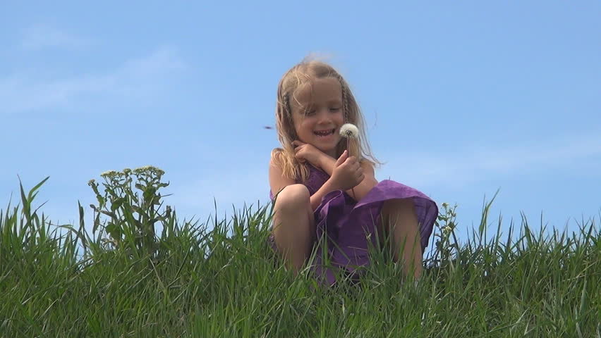 Smiling Child Playing with Dandelion Flowers in Park, Girl on Meadow, Children