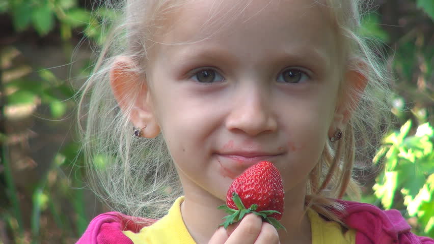 Child Eating Strawberries Sitting, Fruits, Healthy Food at Breakfast, Children
