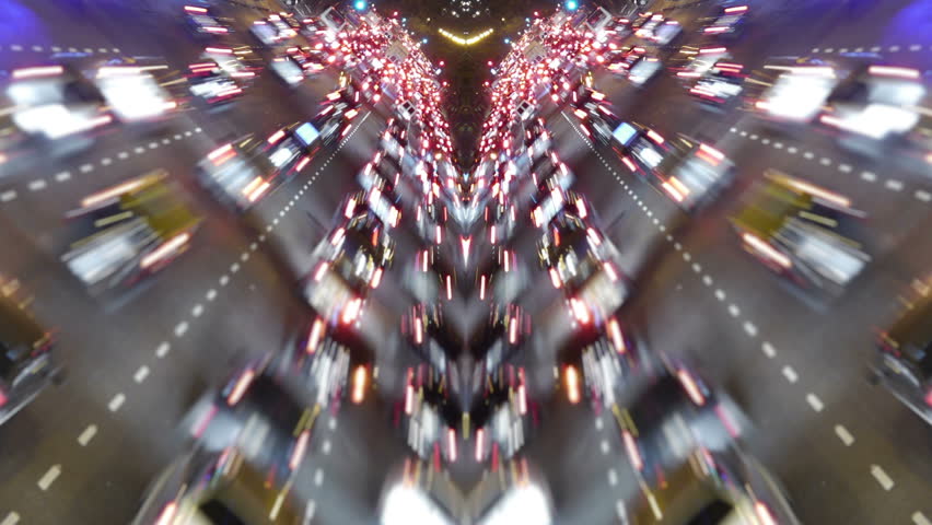 Traffic in the city. Avenue Time-Lapse, symmetric / mirrored, Night. Moon going down. Heavy traffic / jam / flowing with blurred motion.