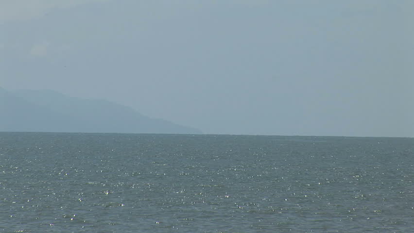 Cruiser Boat and Jet Ski off the coast