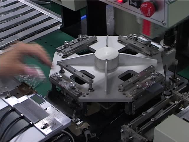 Automated semiconductor component manufacturing production.