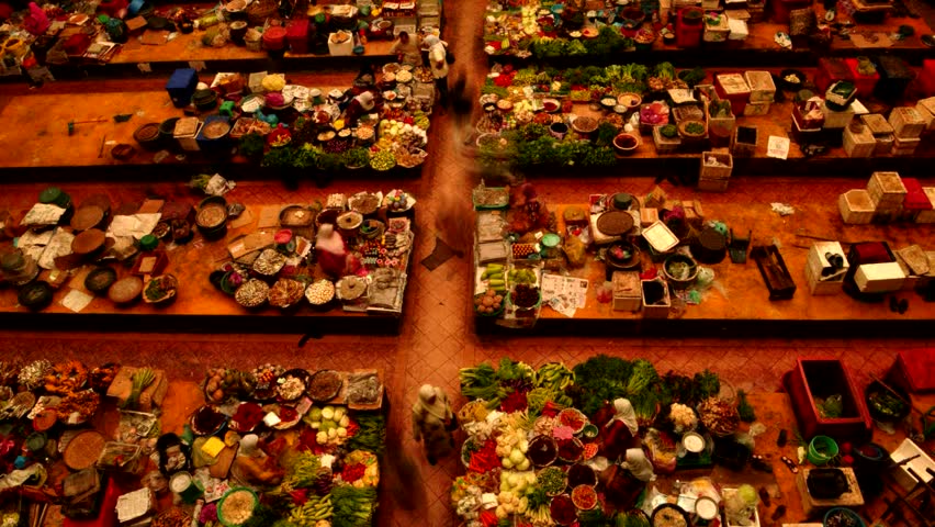 Vegetable market. Muslim woman selling fresh vegetables at market in Kota Bharu Malaysia 