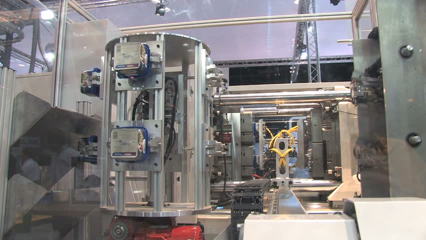 Automated machinery from a factory making containers 