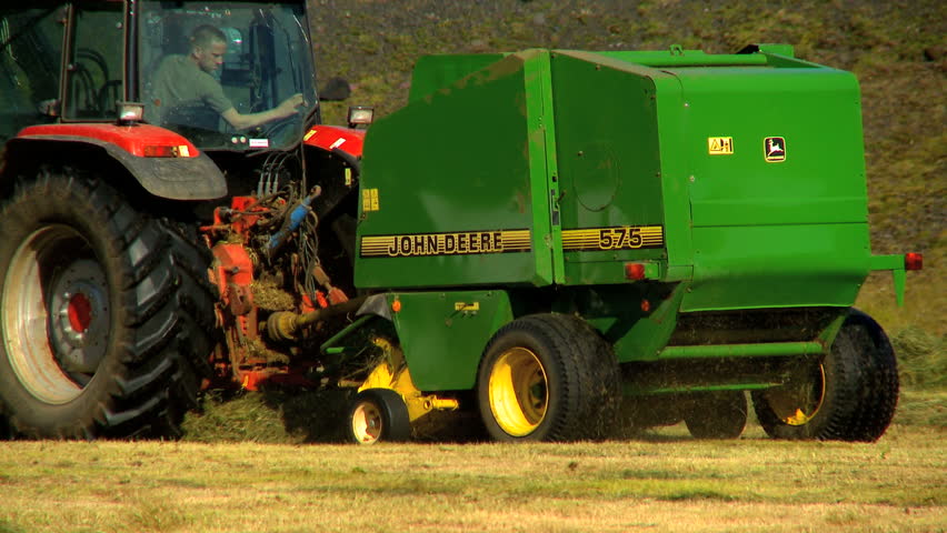 Farmer collecting the harvested crop