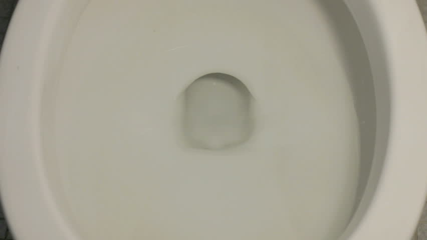 Slow motion toilet bowl flushing