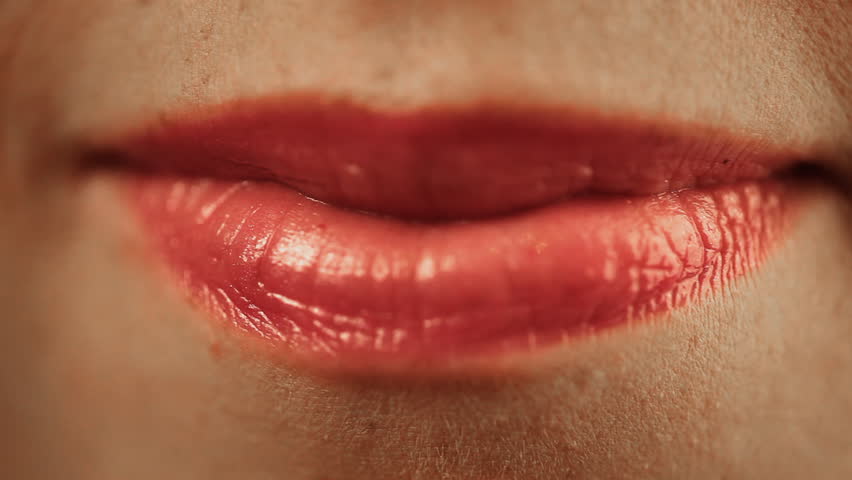 Sensual red lips of young woman 
