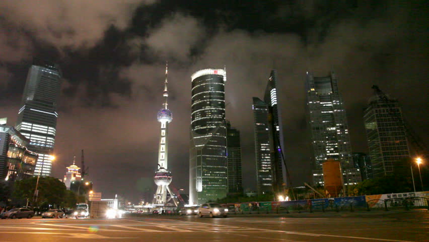 time-lapse video of traffic at an intersection in shanghai china.