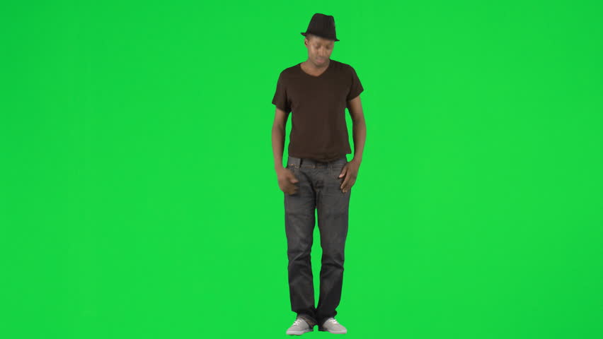 Ethnic young man dancing with a hat footage