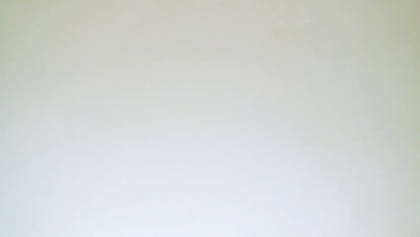 Bloody drops falling on to a white background. 