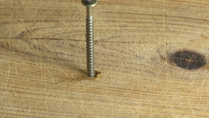 Screwing the screw in wood