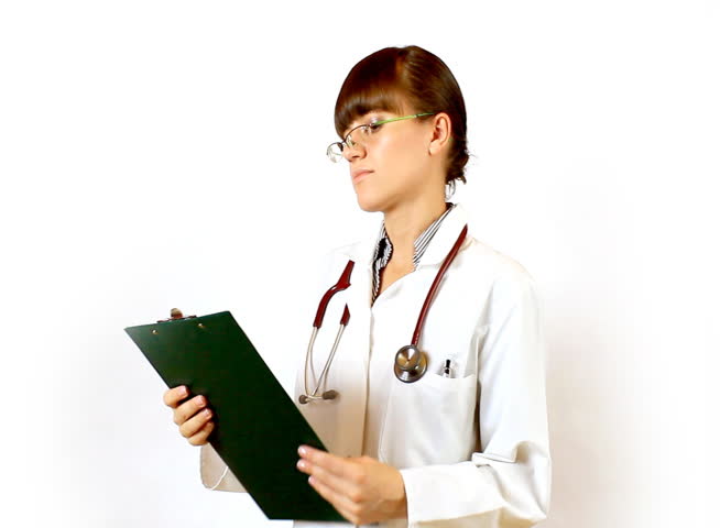 Female doctor recording something on notepad and prohibit