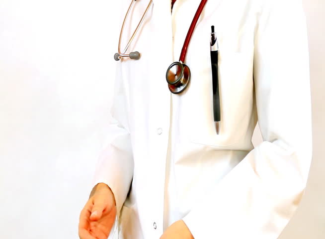 Close up of doctor hands recording something on notepad and gives the  thumb's up sign