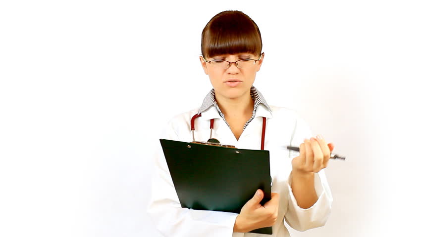 Female doctor recording something on notepad and prohibit