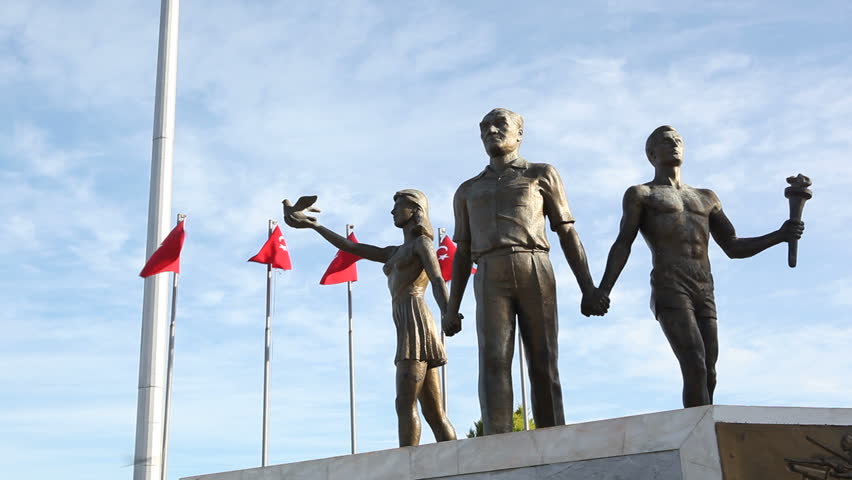 KUSADASI, TURKEY - 19 DECEMBER -  The Kusadasi Monument of Ataturk and Youth on the Promenade. Kusadasi is Major Tourist attraction in the Aegean and visited by about 650 Cruise ships per year.