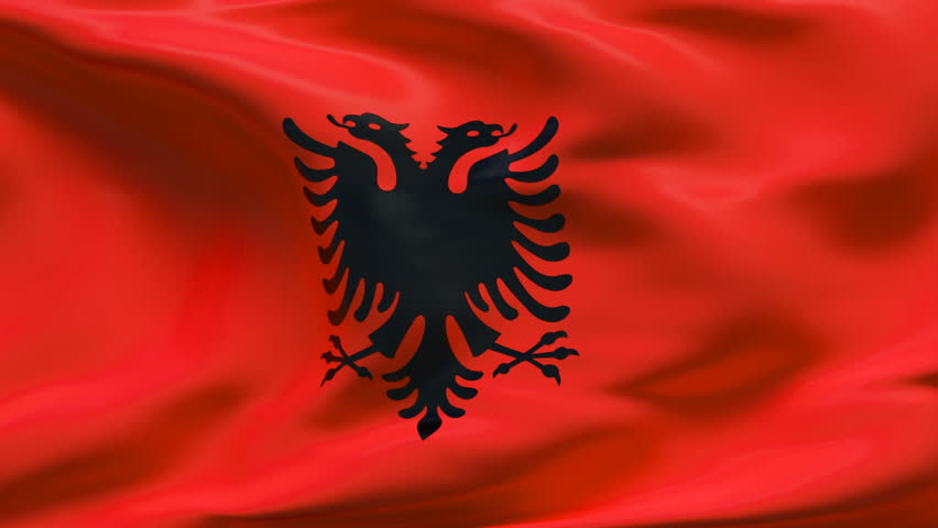 Albanian Flag Waving In Wind With Clouds In Background Stock Footage