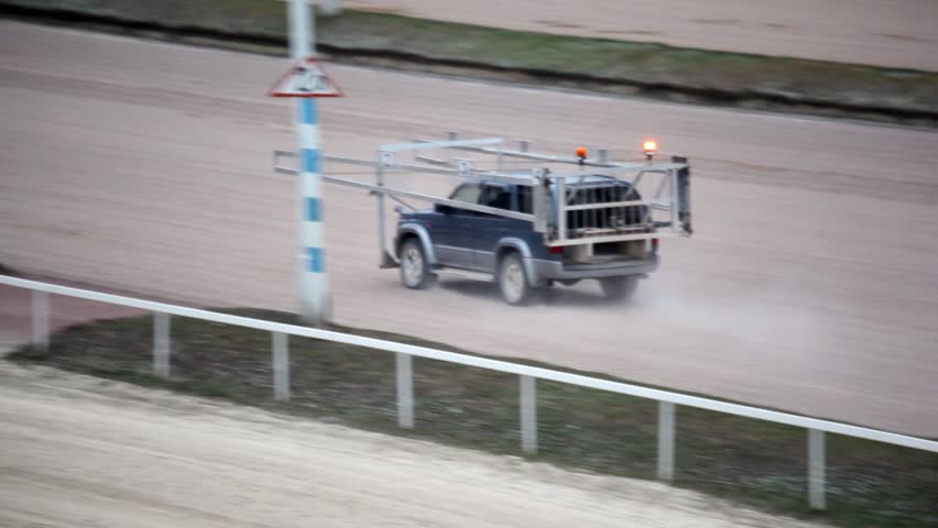 on hippodrome special car of auto start goes in loneliness on track 