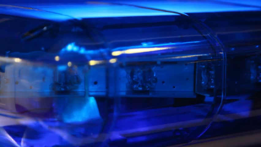 blue flasher of first aid blinking with certain frequency close up 