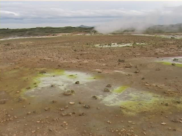 Sulfuric dioxide Gas and Steaming Geyser at Krisuvik hot springs, Iceland.